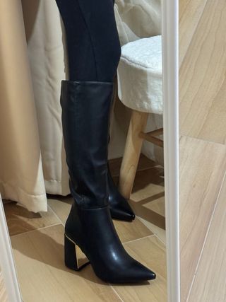 Stivali neri con tacco oro