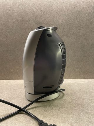 Calefactor eléctrico Marca "OK".