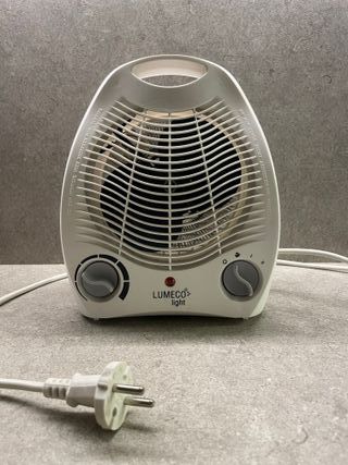 Calefactor eléctrico Marca "OK".