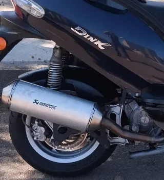 Escape Kymco Dink.