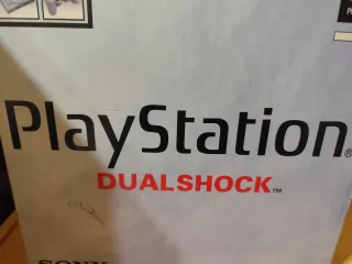 PlayStation 1 DualShock Gris