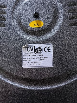 Plancha eléctrica redonda con tapa de cristal