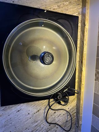 Plancha eléctrica redonda con tapa de cristal