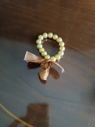 Pulseras de perlas con lazo