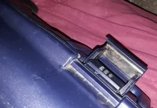 Maleta de viaje azul con ruedas