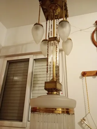 Lámpara de latón antigua.Longitud total 1'20 m.