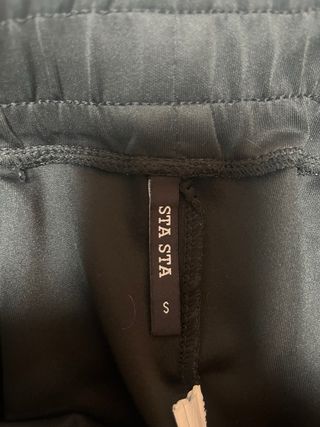 Pantaloni tuta neri con zip taglia S