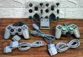 PlayStation 1 con scatola e accessori
