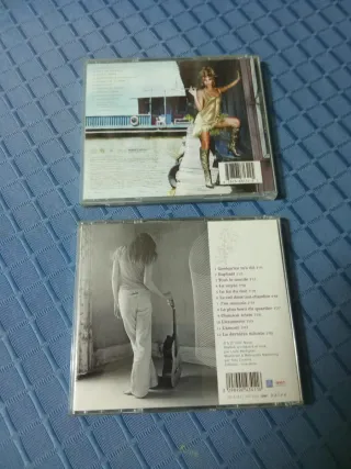 2 CDs Música: Beyoncé y Carla Bruni