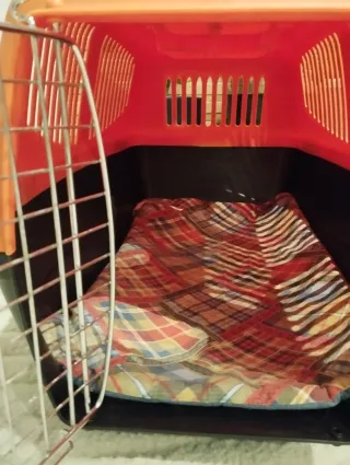 Transportín para mascotas naranja y negro