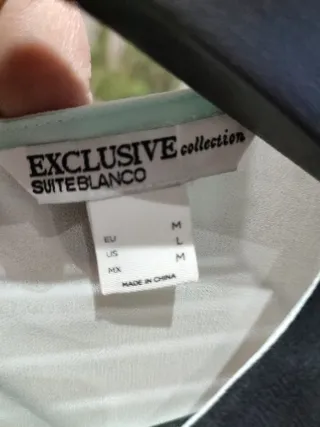 Blusa EXCLUSIVE COLECCIÓN Turquesa claro y Negro.