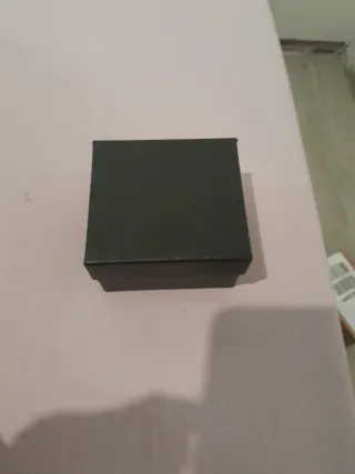 Reloj de pulsera turquesa y plateado