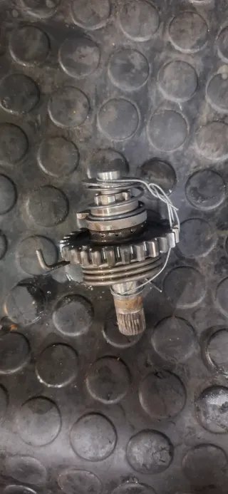 Trinquete eje arranque Suzuki RM 125 90