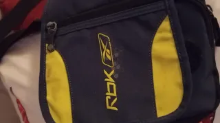 Bandolera Reebok azul y amarilla