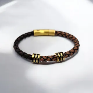 Pulsera hombre Bronn/cuero trenzado en dos tonos.