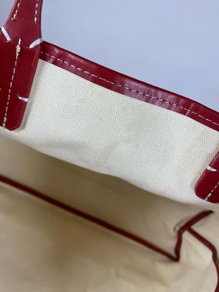 Bolso Goyard con monedero marrón y rojo