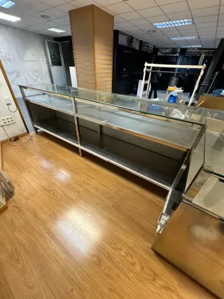 Mostrador de tienda cristal y acero inoxidable
