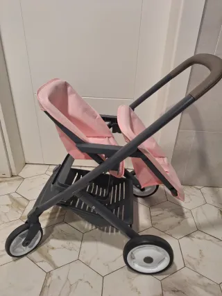Carrito gemelar para muñecas rosa