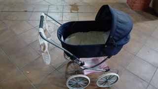 Carrito de muñeca azul con bolso