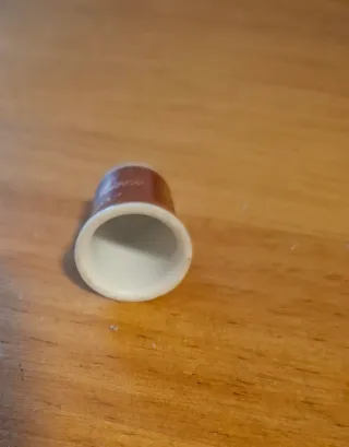 Dedal de colección con figura