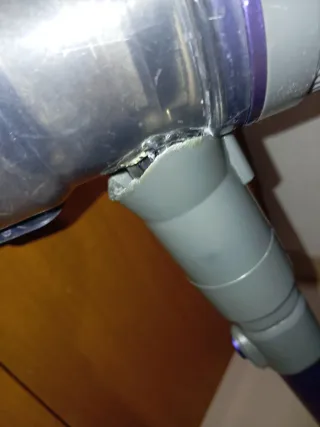 Aspiradora de mano y escoba morada