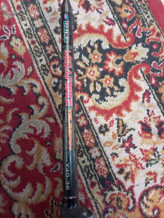 Caña de pescar con carrete