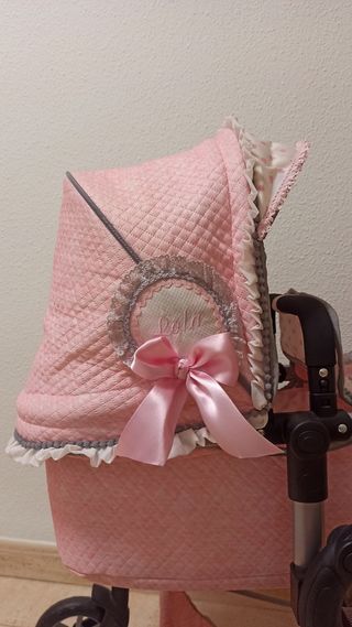 Carrito de muñecas.