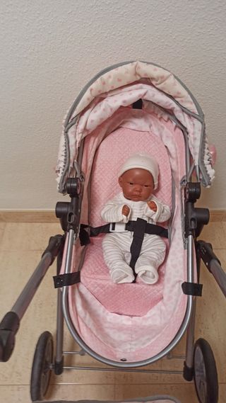 Carrito de muñecas.