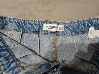 Falda tejana corta azul clara desgastada