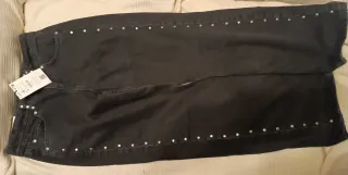 Pantalón vaquero Bershka estrellas rosa T.34.