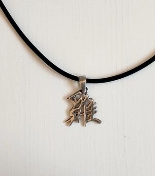 Ciondolo Argento 925 Simbolo con Laccio Caucciù