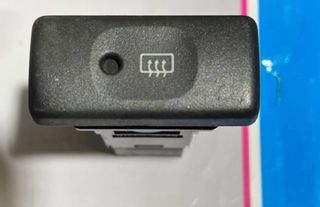 Botón luneta térmica coche