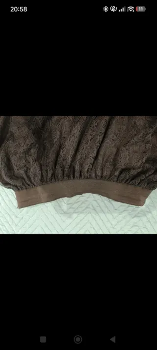 Falda corta de encaje negra