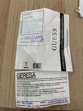 Reloj Guess bicolor verde y dorado