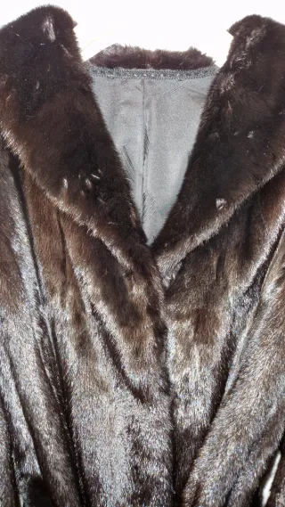 Pelliccia nera con cintura tg. 44