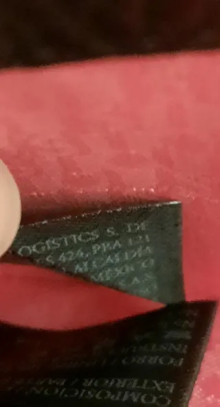 Cartera Tous Negra Oso. Interior fucsia.