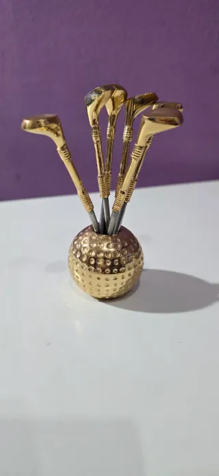 Palitos de cóctel dorados