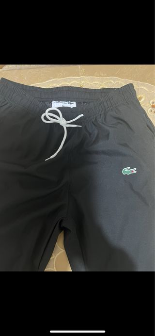 Tuta Lacoste bianca e nera