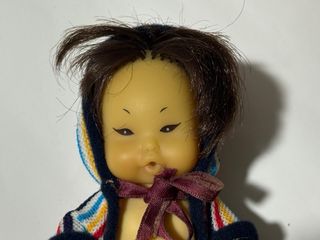 Muñeca barriguita china 97