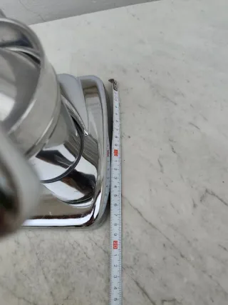 Exprimidor de cítricos cromado