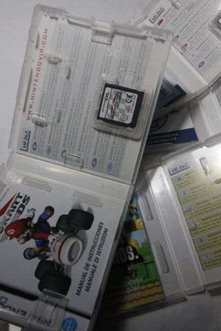 DS Lite Blanca + 4 Juegos (Mario Kart, Mario)