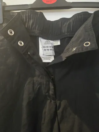 Pantalones Adidas negros con rayas