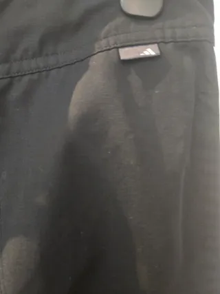 Pantalones Adidas negros con rayas