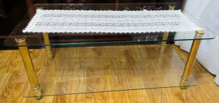 Mesa de centro cristal y metal dorado