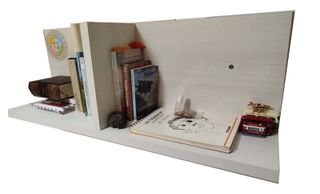 Cama nido con cómoda y estantería