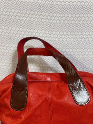 Borsa in pelle rossa con manici marroni