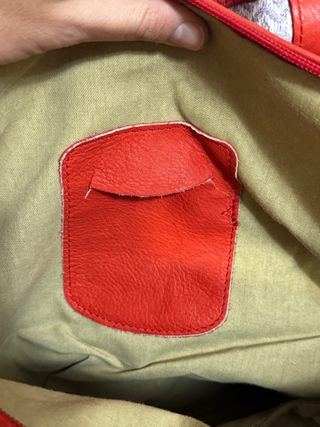 Borsa in pelle rossa con manici marroni