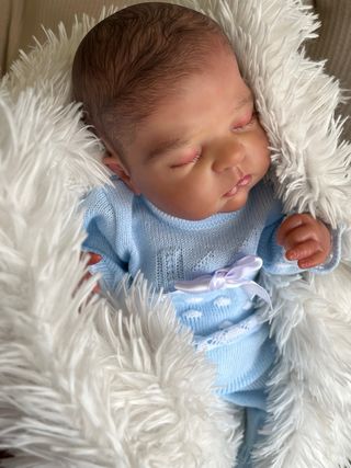 Bebé Reborn realista con chupete