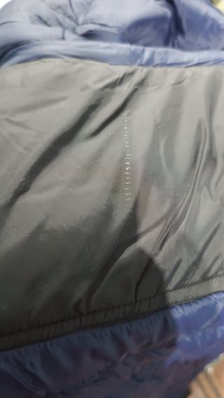 Chaqueta The North Face azul y negra