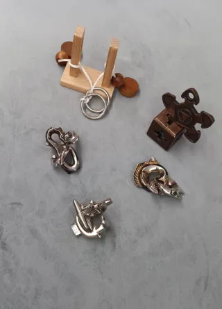 5 rompicapo enigmi metallo e legno da risolvere